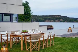 Skargaarden Kryss lounge stol, teak - mörkgrå Sunbrella Heritage